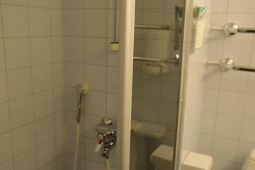 Фото номера Стандартный одноместный номер Отель Hotel Nukkumatti г. Коккола 8